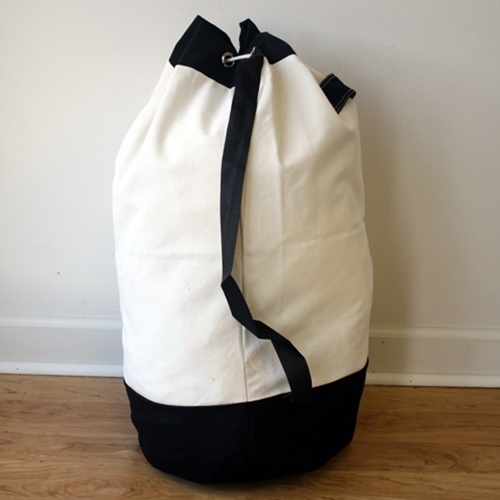 Heavy duty white canvas bag with black bottom