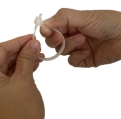 6" White Resealable Cable Tie in Locked Position