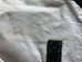 Slight discoloration on irregular canvas bag