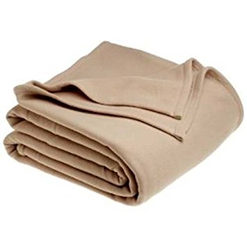 Stack of tan fleece blankets