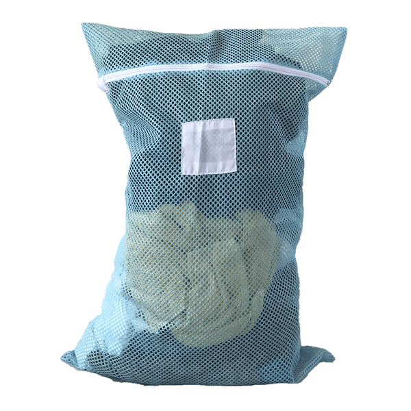 How are mesh net laundry bags used in washing delicate clothing?